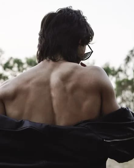 A guest outdoors after a session, shoulders loose